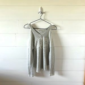 Cut out shoulder hoodie with saying ‘eat your veggies’